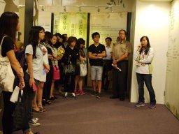 staff of Hung Fook Tong explaining the benefits of herbal drink